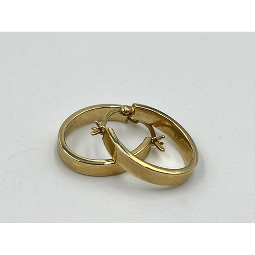 1203 - A pair of 9ct gold earrings - approx. gross weight 1.45 grams