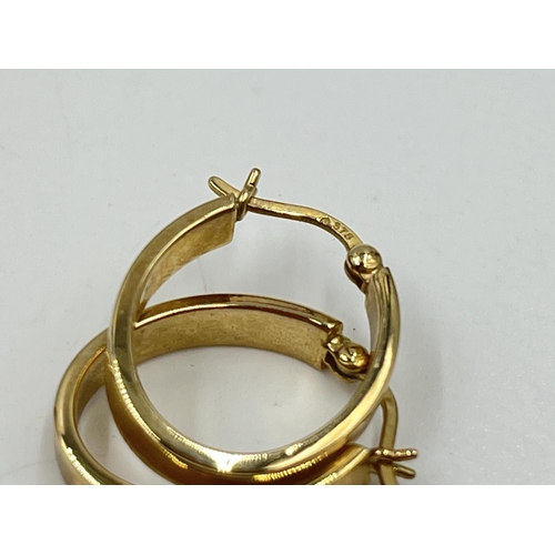 1203 - A pair of 9ct gold earrings - approx. gross weight 1.45 grams