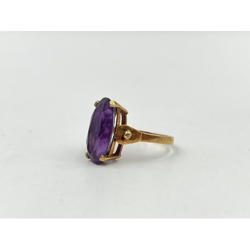 1204 - A 9ct gold amethyst solitaire ring - approx. gross weight 5 grams