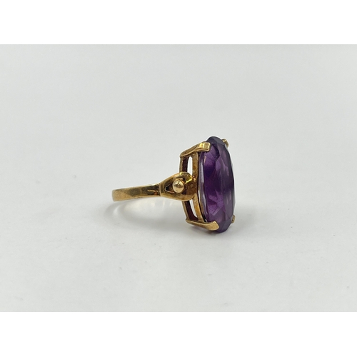 1204 - A 9ct gold amethyst solitaire ring - approx. gross weight 5 grams