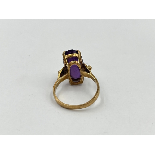 1204 - A 9ct gold amethyst solitaire ring - approx. gross weight 5 grams