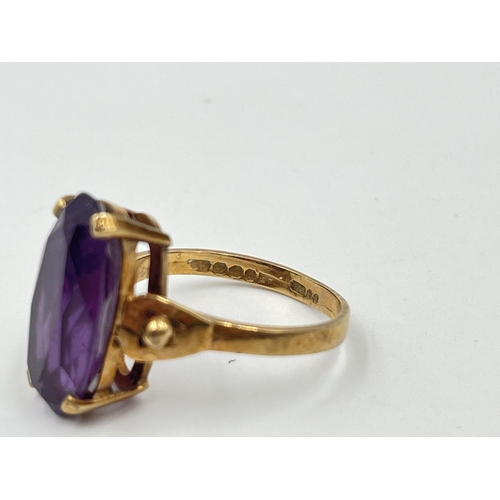 1204 - A 9ct gold amethyst solitaire ring - approx. gross weight 5 grams