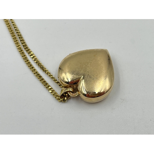 1209 - A hallmarked 9ct gold chain necklace with hallmarked 9ct gold heart shaped locket - approx. gross we... 