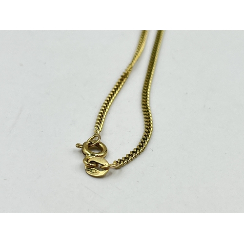 1209 - A hallmarked 9ct gold chain necklace with hallmarked 9ct gold heart shaped locket - approx. gross we... 