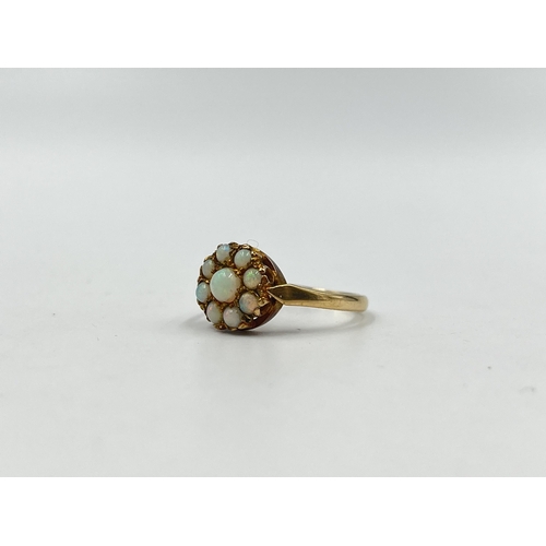 1210 - A 9ct gold opal cluster ring, hallmarked Birmingham 1966, size N½ - approx. gross weight 2.38 grams