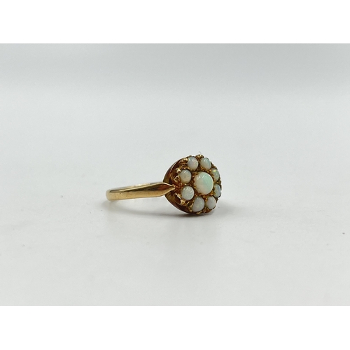 1210 - A 9ct gold opal cluster ring, hallmarked Birmingham 1966, size N½ - approx. gross weight 2.38 grams