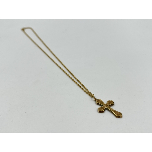 1213 - A hallmarked 9ct gold chain necklace with unmarked yellow metal cross pendant - approx. gross weight... 