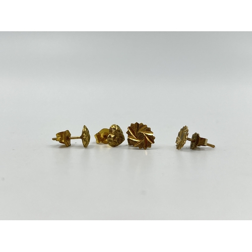 1216 - Two pairs of yellow metal earrings, one pair hallmarked 9ct gold - approx. gross weight 1.3 grams