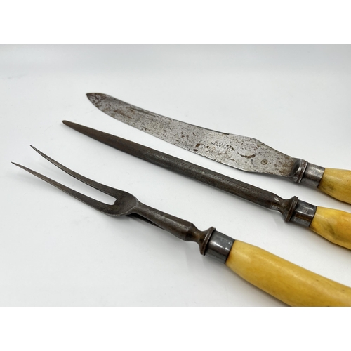 1251 - An R. Clark Newcastle three piece bone handled carving set with hallmarked Sheffield silver collars