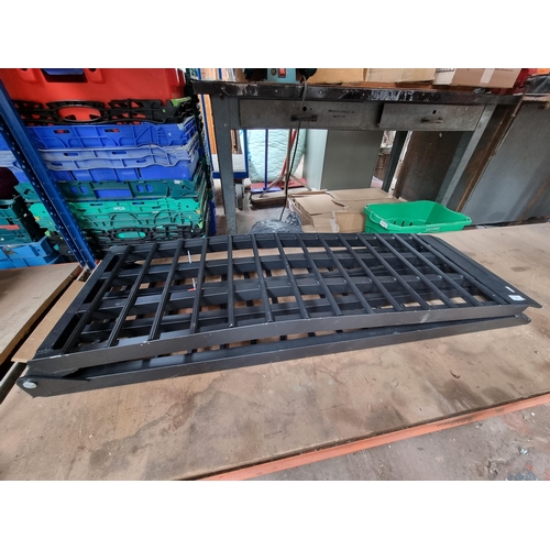 864 - A metal folding car loading ramp