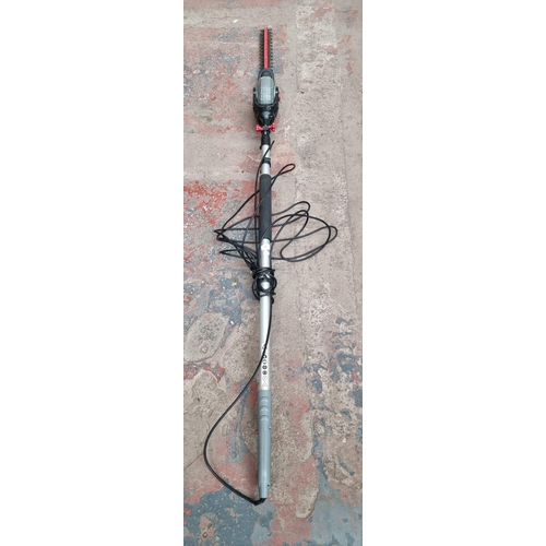 870 - An Eckman 240v telescopic hedge trimmer