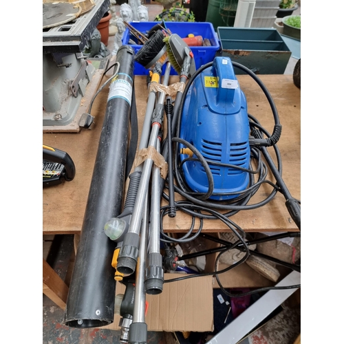 884 - An unbranded 240v pressure washer with attachments