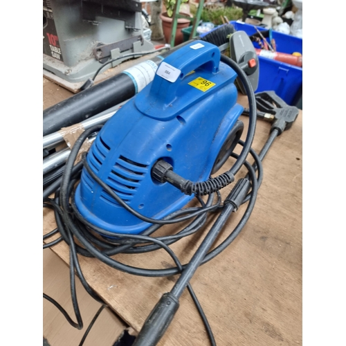 884 - An unbranded 240v pressure washer with attachments