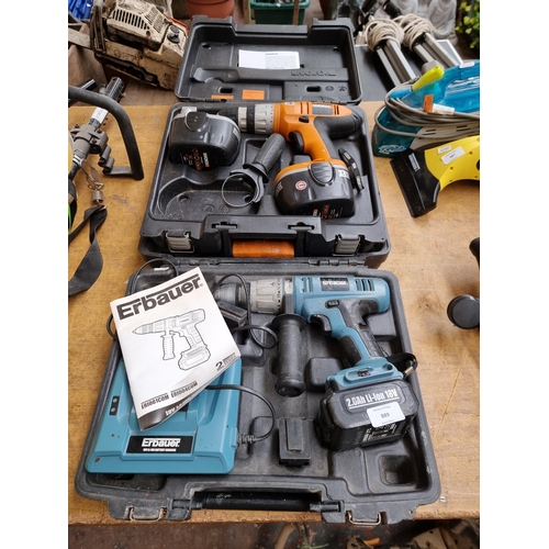 889 - Two cased cordless hammer drills with battery chargers and instruction manuals, one Worx and one Erb... 