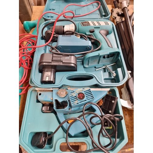 891 - Five items, two vintage jerrycans, one cased cordless drill, one cased 240v sander and one Bosch Eas... 