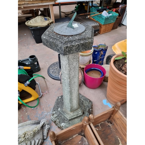 948 - A 19th century style cast stone sun dial on stepped pedestal base