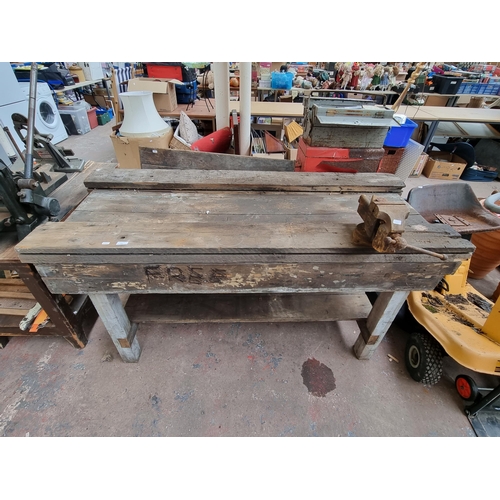 955 - A mid 20th century two tier work bench with fitted Record no. 74 Auto-Vice cast iron vice and anvil