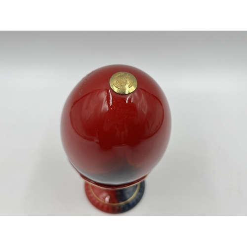 254 - A Royal Doulton Flambe no. 1397 egg and stand