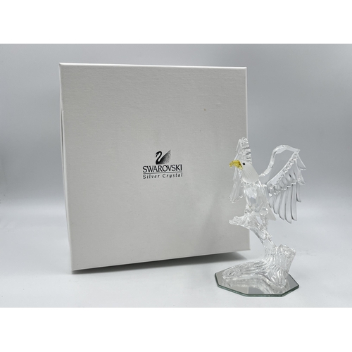 257 - A boxed Swarovski Crystal Bald Eagle figurine, model no. 248003 - approx. 13cm high