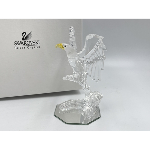 257 - A boxed Swarovski Crystal Bald Eagle figurine, model no. 248003 - approx. 13cm high