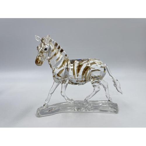 260 - A boxed Swarovski Crystal Zebra figurine - model no. 1050853