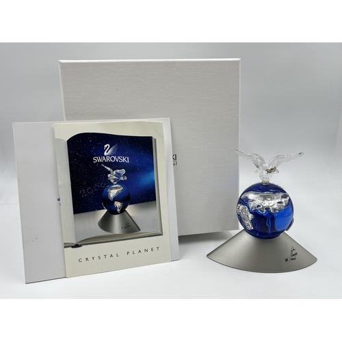 265 - A boxed Swarovski Crystal Millennium 2000 Edition Crystal Planet figurine - model no. 238985