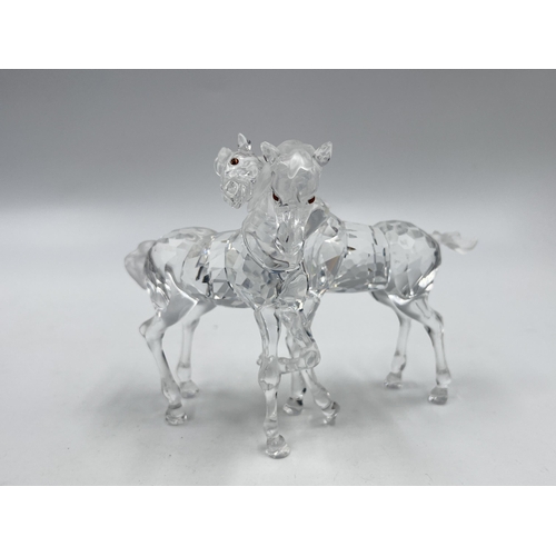 274 - A boxed Swarovski Crystal Foals figurine - model no. 627637