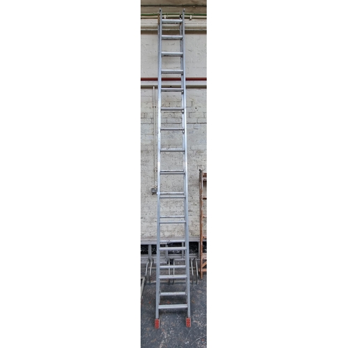 813 - A pair of Clima aluminium extending ladders