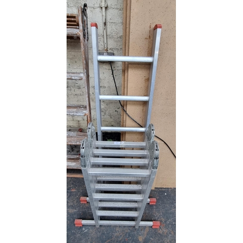 815 - Two aluminium multi purpose folding ladders