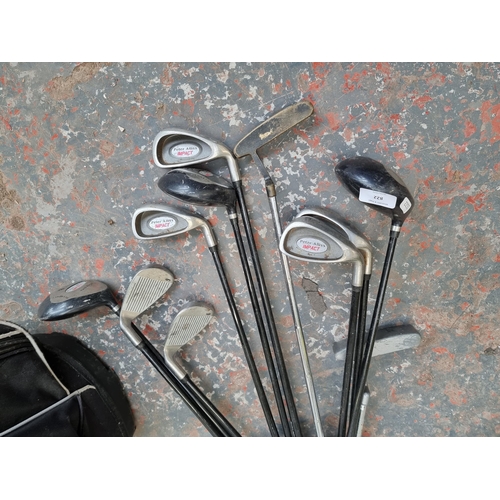 822 - A set of nine Peter Alliss Impact golf clubs