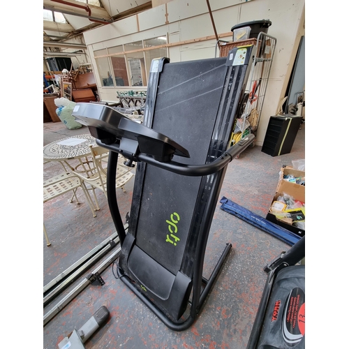 831A - An Opti electric folding treadmill with digital readout