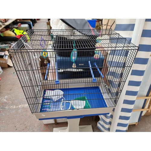 958 - Three items, one bird cage, one sun canopy and one folding deck chair