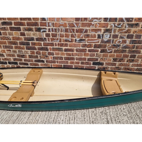 866 - A Coleman Explorer 166 Canadian canoe with oars - approx. 16' 7'' long, 3' 1'' wide x 1' 6'' deep