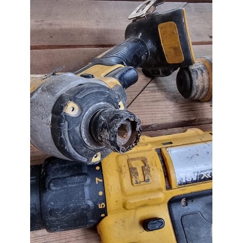 891B - Three DeWalt cordless power drills with one battery