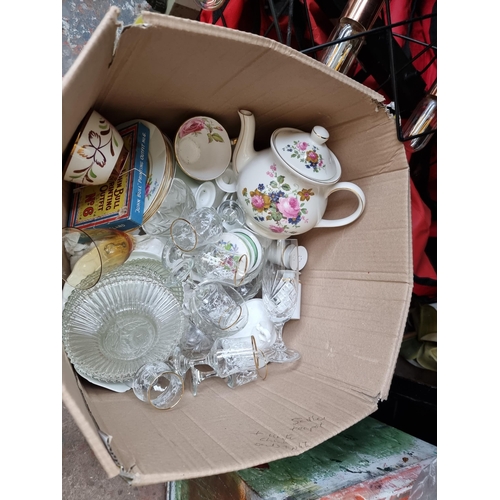 960A - Five boxes containing assorted items to include ceramics, glassware, wall lights etc.