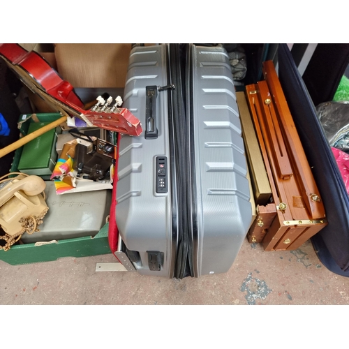 964C - Two boxes and two suitcases containing house clearance items to include t-shirts, acoustic guitar, r... 