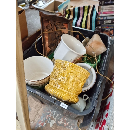 965C - A large collection of house clearance items to include fridge magnets, ceramics, vintage leather sui... 