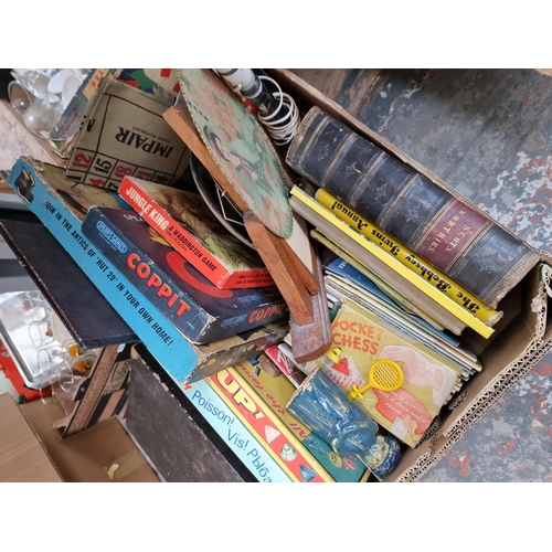 968A - Three boxes containing house clearance items to include cutlery, vintage board games, sterling silve... 