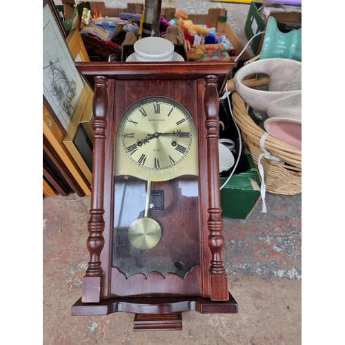 975 - A collection of house clearance items to include Wood & Sons 31 day wall clock with pendulum, framed... 