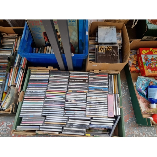 979 - Six boxes containing a large quantity of DVDs, CDs and vinyl records