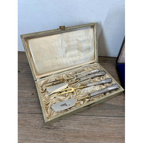 355 - Three cased sets of silver plated cutlery