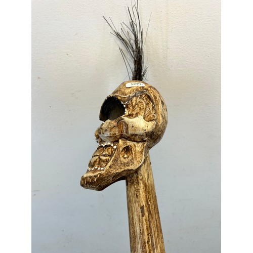 549 - Two tribal style items, one spear and one staff with skull head top