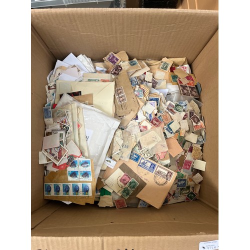 971A - Two boxes containing a large quantity of worldwide stamps