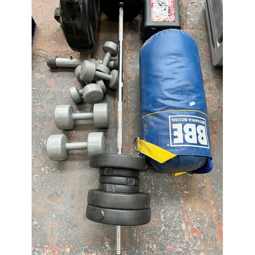 830 - A collection of fitness equipment to include dumbbells, barbell with weights, cased York Fitness 15k... 