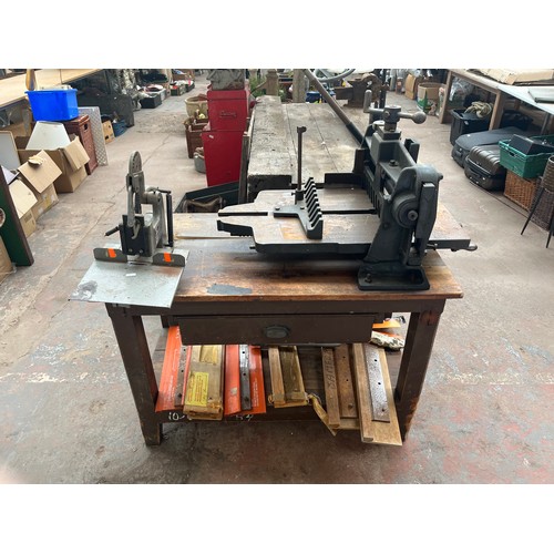 956 - A vintage pine two tier workbench with mounted T.C. Thompson & Son Ltd. of Manchester cast iron indu... 