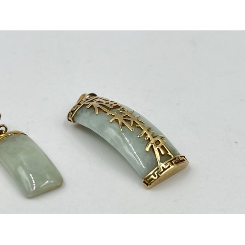 1014 - A 9ct gold jade pendant and drop earrings set with traditional Chinese characters - approx. gross we... 