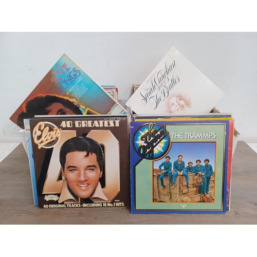 647 - Two boxes containing a collection LP vinyl records to include Elvis Presley, The Jam, Queen, The Bea... 