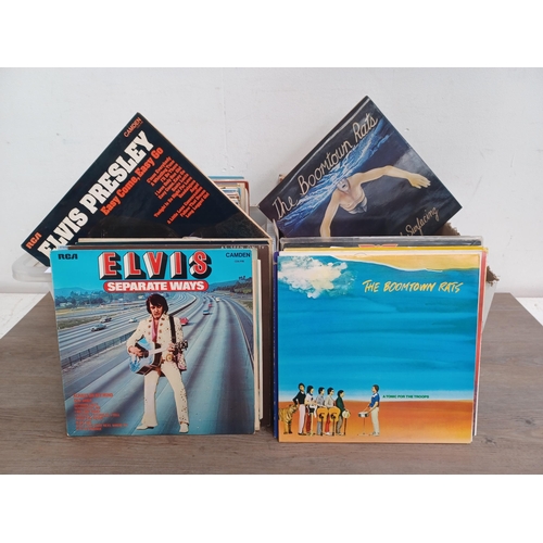 647 - Two boxes containing a collection LP vinyl records to include Elvis Presley, The Jam, Queen, The Bea... 