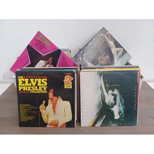 647 - Two boxes containing a collection LP vinyl records to include Elvis Presley, The Jam, Queen, The Bea... 