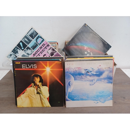 647 - Two boxes containing a collection LP vinyl records to include Elvis Presley, The Jam, Queen, The Bea... 